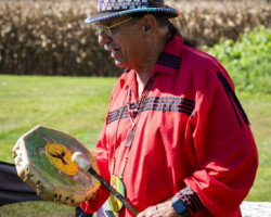 Barry Lee of the Munsee Turtle Clan performs some native music.