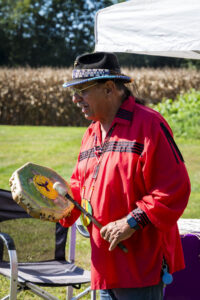 Barry Lee of the Munsee Turtle Clan performs some native music.